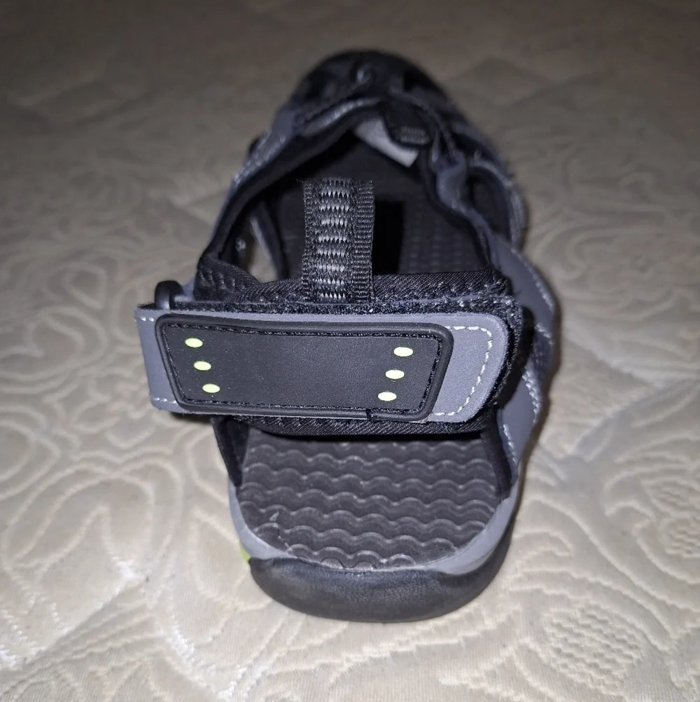 A pair of Coleman George sandals in a men's size 13M. They're in excellent shape